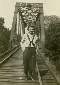 People posing with bridges