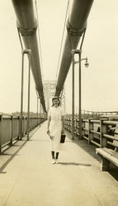People posing with bridges